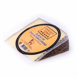 Enrique Tomas semi cured sheep cheese wedge