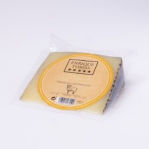 Enrique Tomas cured sheep cheese wedge